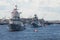 Ships of the Russian Navy in a wake column in the water area of the Neva. Navy Day in St. Petersburg
