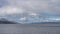 Ships sail on the Beagle Channel. Ripples on the water.