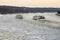 Ships sailing along the Moscow-River covered with ice floes towards each other