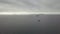 Ships sailing in sea on skyline background aerial view from flying drone