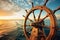 A ships steering wheel stands against a serene sunset, symbolizing the careful navigation of the ocean, ship wheel on boat with