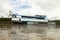 Ships transporting passengers and materials on the Huallaga River in the Peruvian Amazon.