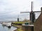 Ships and windmills in the port city Heusden.