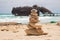 Shipwreck on Cape Verde beach with stone pile