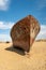 shipwreck. Ecological disaster of Aral Sea. Rusty ships at the ship graveyard in Aral sea port town Moynaq, Uzbekistan