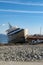 Shipwrecked yacht on a beach
