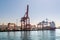 Shipyard of the Port of Haydarpasha with cranes and loaded container ship, Istanbul, Turkey