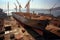 shipyard, with view of massive ship under construction on floating drydock