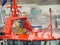 Shipyard worker cleans a new ship before delivery to the customer