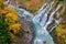 Shirahige Waterfall in Fall and Autumn Season, Hokkaido, Japan