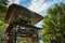 Shirakawago, Gifu, Japan - Ocotber 2022 - Shirakawa Hachiman Shrine gate area at Shirakawago village with pine trees and Japanese