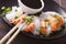 Shirataki Noodles with shrimp and green onions close-up. horizon