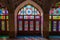 Shiraz,Iran - 04.07.2019: Interior of the Pink Mosque in Shiraz. Islamic ornaments, sun shines through colorful glass