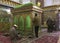 Shiraz, Iran - 2019-04-09 - Shah Ceragh Shrine - men pray at mirrored tomb of mullah