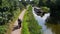 Shire Horse pulls a barge on The Grand Western Canal Tiverton In Devon