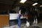 Shire Horse stables preparation for a carriage trip out