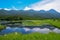 Shiretoko mountain range in summer season view from fifth lake view point in Shiretoko Goko lake, Hokkaido, Japan.