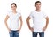 Shirt design and people concept - close up of young man and woman in blank white t-shirt isolated.