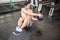 Shirtless man exercising with medicine ball