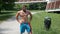 Shirtless muscle man jogging on pathway