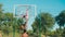 Shirtless sportsmen playing basketball on court