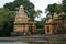 Shiva temple and bell tower on the bank of river krishna in rainy season