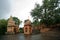 Shiva temple and bell tower on the bank of river krishna in rainy season