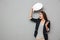 Shocked asian business woman holding blank speech bubble overhead