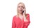 Shocked blond woman listening to a phone call