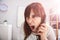 Shocked Businesswoman Talking On Telephone