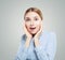 Shocked girl student on white background. Emotions, facial expression