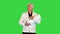 Shocked grand dad Little baby in his grandfather`s hands on a Green Screen, Chroma Key.