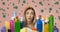 Shocked housewife with assortment of cleaning supplies surrounded by viruses and germs, collage