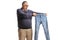 Shocked mature man holding a small pair of jeans