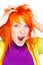 Shocked screaming woman holding red head