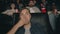 Shocked student watching film in cinema with open mouth eating popcorn smiling