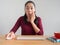 Shocked and surprised woman working on her desk.