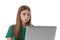 Shocked teenage girl with laptop on white. Danger of internet