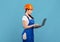 Shocked Young Handywoman In Coveralls And Hard Hat Using Laptop Computer