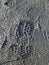 Shoe marks on a dirty surface close up