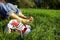 Shoes and bare feet on grass