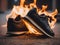 Shoes on fire on the street background. Burning shoes on carpet background. Concept it\\\'s time to buy a new pair of shoes