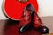 Shoes groom on a guitar background