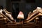 Shoes with rubber soles in a storefront of a shoemaker workshop, standing on an antique shoe care box.