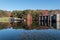 Shohola Lake on a calm fall morning with blue skies