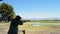 Shooter man skeet aiming and firing a rifle in championship