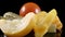 Shooting of rotating pickled vegetables on black background