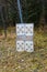 Shooting targets setup on plywood in front of trees