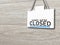 The shop front sign with the words` sorry we are close with blurred background image. Use for cafe business that is closing.