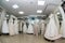 Shop interior with wedding dresses on mannequins